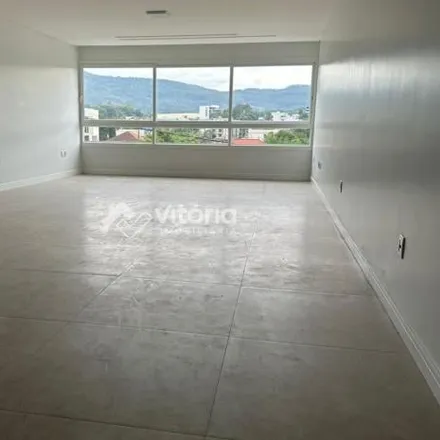 Rent this 3 bed apartment on Avenida Antônio de Conto in Centro, Encantado - RS