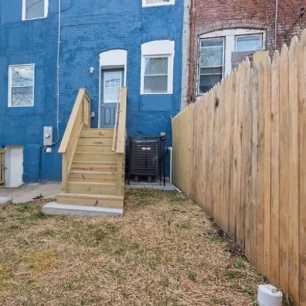 Rent this 4 bed house on 523 Denison Street in Baltimore, MD 21229