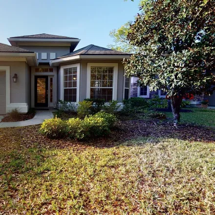 Rent this 4 bed house on 5937 Wind Cave Lane in Jacksonville, FL 32258