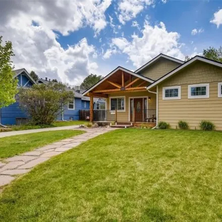 Rent this 3 bed house on 1899 Glen Garry Drive in Lakewood, CO 80215