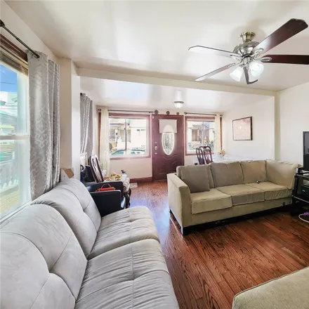 Buy this 3 bed house on 85-10 120th Street in New York, NY 11415