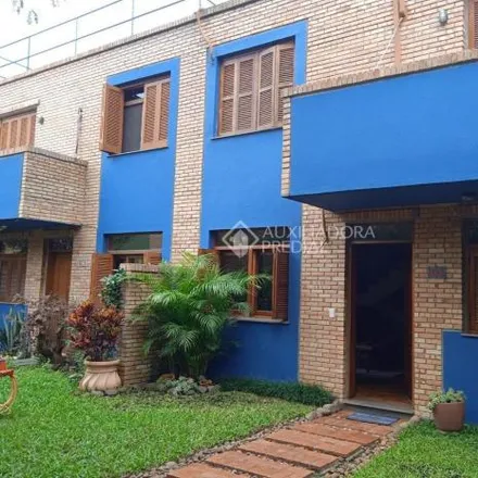 Buy this 3 bed house on Rua Amapá in Vila Nova, Porto Alegre - RS