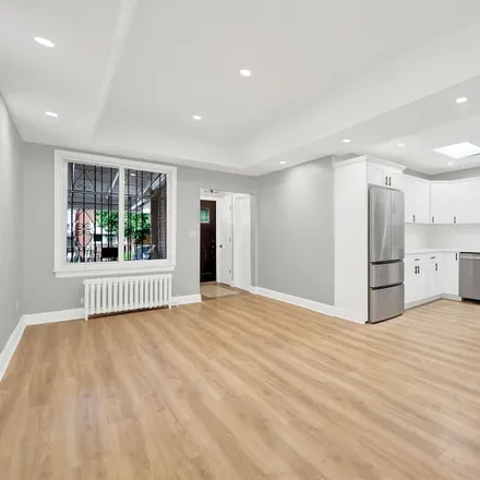 Buy this 3 bed house on 26-17 95th Street in New York, NY 11369