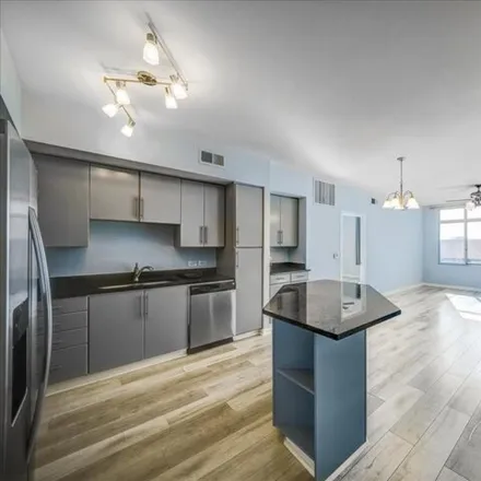 Rent this 2 bed condo on 54 Rainey Street in Austin, TX 78701