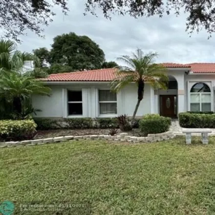 Rent this 4 bed house on 5301 Northwest 44th Avenue in Coconut Creek, FL 33073