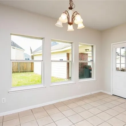 Rent this 4 bed house on 22907 Breton Pointe Drive in Spring, TX 77373