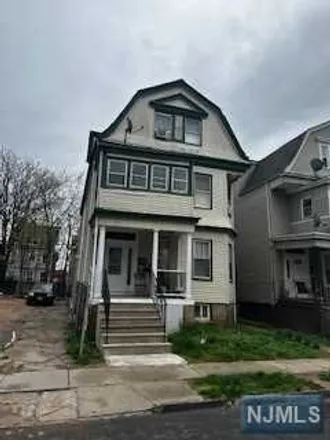 Buy this 8 bed house on 198 Amherst Street in East Orange, NJ 07018