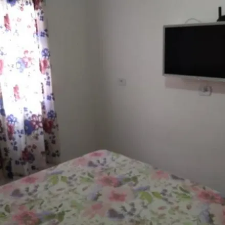 Buy this 2 bed apartment on Estrada Comendador Orlando Grande in Tingidor, Embu das Artes - SP
