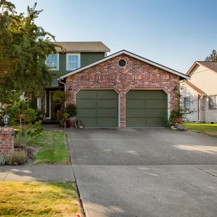 Buy this 4 bed house on 910 23rd Street Northwest in Puyallup, WA 98371