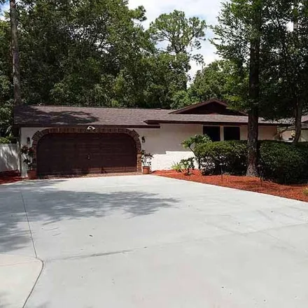 Buy this 4 bed house on 2008 Curry Road in Lutz, FL 33613