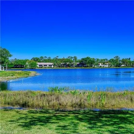 Buy this 2 bed condo on 2582 Kings Lake Boulevard in Collier County, FL 34112