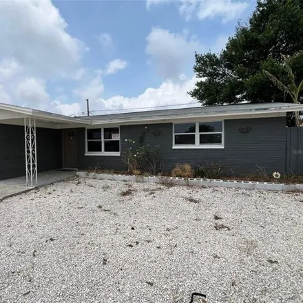 Buy this 3 bed house on 3963 Cedarwood Drive in Holiday, FL 34691