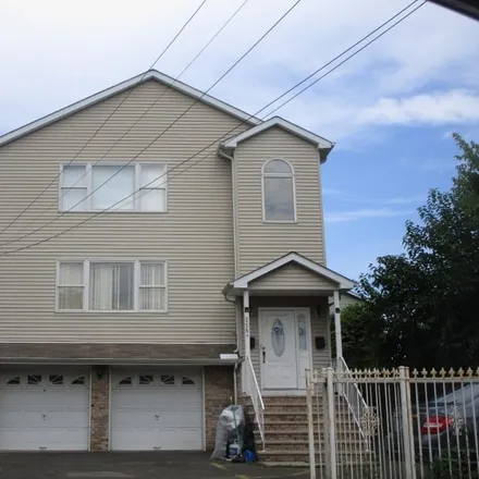 Buy this 6 bed townhouse on 258 East 17th Street in Paterson, NJ 07524