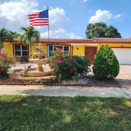 Buy this 4 bed house on 5755 Southwest 8th Street in Plantation, FL 33317