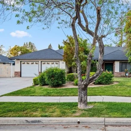Buy this 4 bed house on 3092 West Escalon Avenue in Fresno, CA 93711