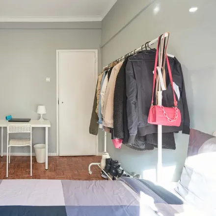 Rent this 6 bed room on Rua República da Bolívia in 1500-544 Lisbon, Portugal