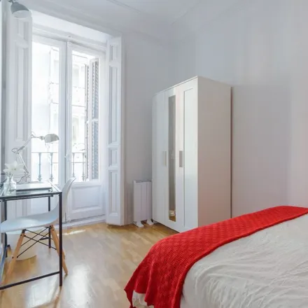 Rent this 9 bed room on Calle de Valenzuela in 10, 28014 Madrid