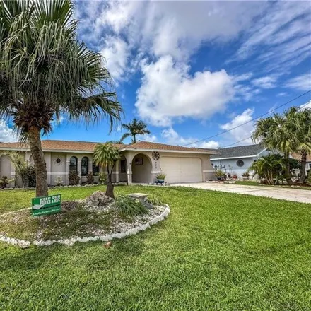 Buy this 3 bed house on 920 Se 4th Pl in Cape Coral, Florida