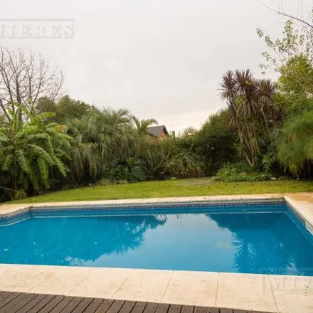 Buy this 4 bed house on unnamed road in Partido de Tigre, 1617 General Pacheco
