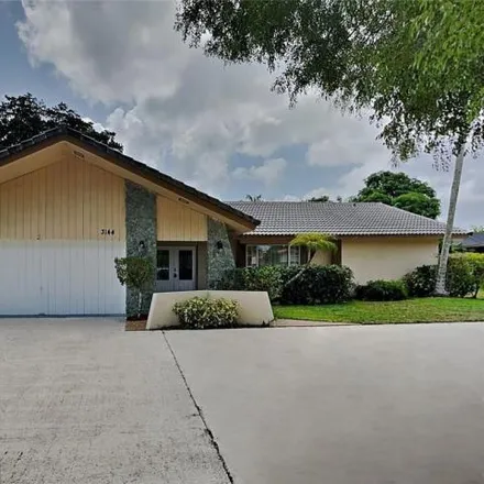 Rent this 4 bed house on 3156 Northwest 114th Avenue in Coral Springs, FL 33065