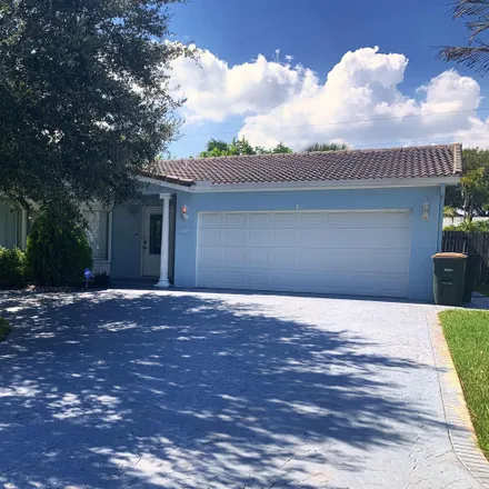 Rent this 3 bed house on 4201 Northeast 22nd Terrace in Lighthouse Point, FL 33064
