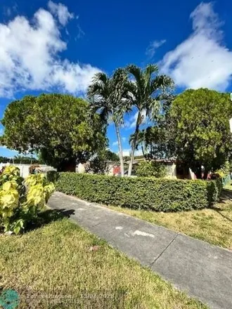 Buy this 5 bed house on 3051 Northwest 100th Street in Miami-Dade County, FL 33147
