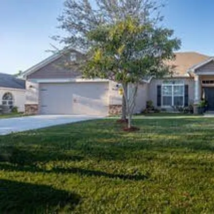 Buy this 4 bed house on 2116 Southeast Holland Street in Port Saint Lucie, FL 34952