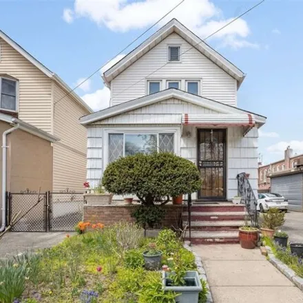 Buy this 3 bed house on 88-51 69th Road in New York, NY 11375