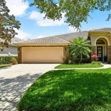 Buy this 4 bed house on 1067 Surreywood Lane in Paola, Seminole County