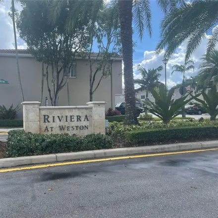 Buy this 2 bed townhouse on 235 Riviera Circle in Weston, FL 33326