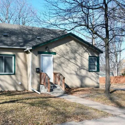 Buy this 4 bed house on 3657 North Logan Avenue in Minneapolis, MN 55412