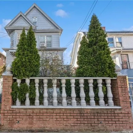 Buy this 6 bed house on 145-32 33rd Avenue in New York, NY 11354