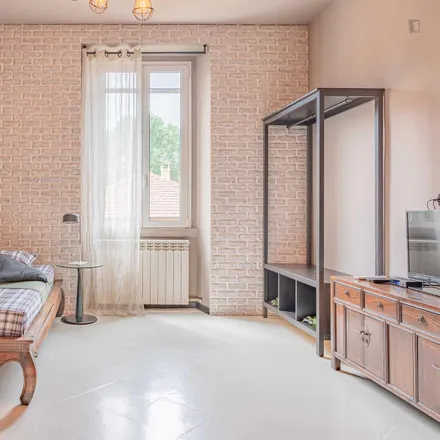 Rent this 2 bed room on Via Lodovico il Moro in 139, 20142 Milan MI