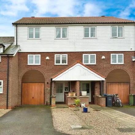 Buy this 4 bed townhouse on Burton Waters in Marine Approach, Burton