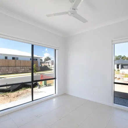 Rent this 4 bed apartment on Waratah Circuit in Greenbank QLD 4124, Australia