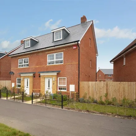 Rent this 3 bed townhouse on Stane Street in Westhampnett, PO18 0NS