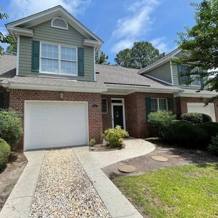 Rent this 3 bed house on 233 Racine Dr Unit 37 in Wilmington, North Carolina