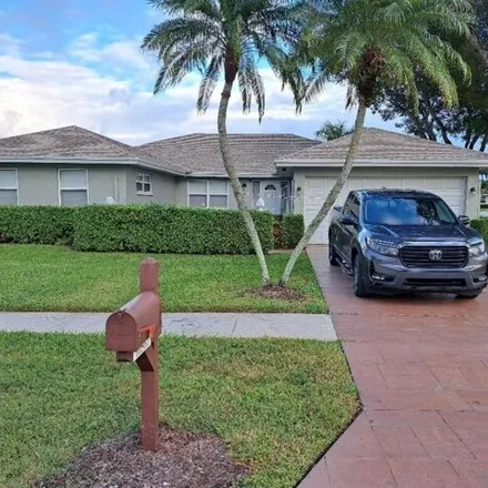 Rent this 3 bed house on 10567 Pineada Circle in Palm Beach County, FL 33436