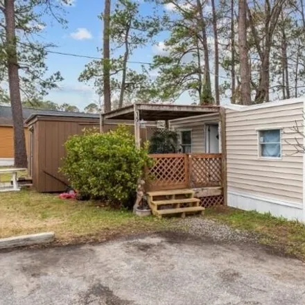 Buy this studio apartment on 5521 Gwen Drive in Stalvey, Horry County