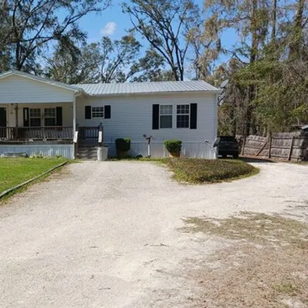 Buy this studio apartment on 1007 171st Road in Suwannee County, FL 32060