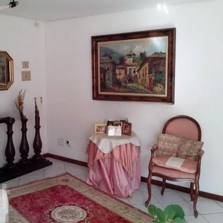 Buy this 3 bed house on Rua Capão da Canoa in Ipanema, Porto Alegre - RS
