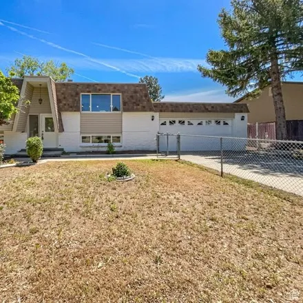 Buy this 4 bed house on 6123 Don Carlos Drive in Taylorsville, UT 84129