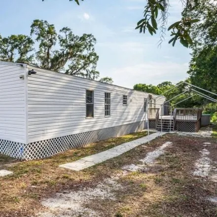 Buy this studio apartment on 12167 Hicks Road in Pasco County, FL 34669