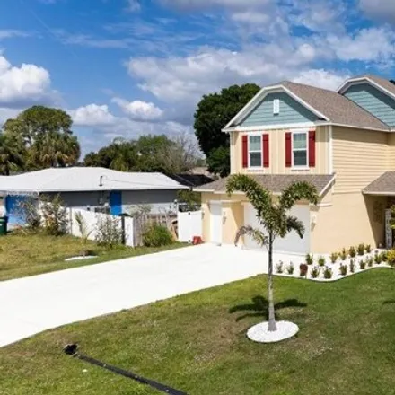 Buy this 6 bed house on 1033 Southwest General Patton Terrace in Port Saint Lucie, FL 34953