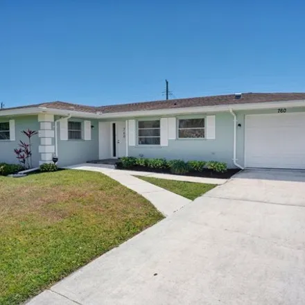 Buy this 2 bed house on 742 Northeast Cypress Street in Saint Lucie County, FL 34952