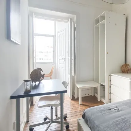 Rent this 4 bed room on IDN in Calçada das Necessidades, 1399-011 Lisbon