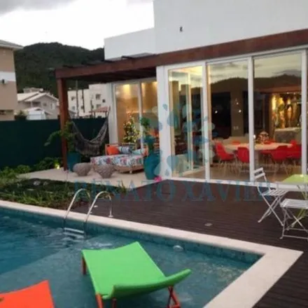 Rent this 4 bed house on Rua das Salseiras in Palmas, Governador Celso Ramos - SC