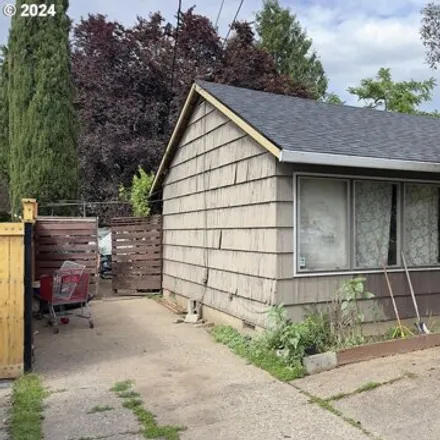 Buy this 3 bed house on 9135 SE Pine St in Portland, Oregon