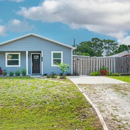 Buy this 3 bed house on 1127 12th Court Southwest in Florida Ridge, FL 32962