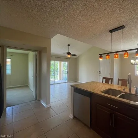 Rent this 2 bed condo on Wildwood Lakes Boulevard in Collier County, FL 34104